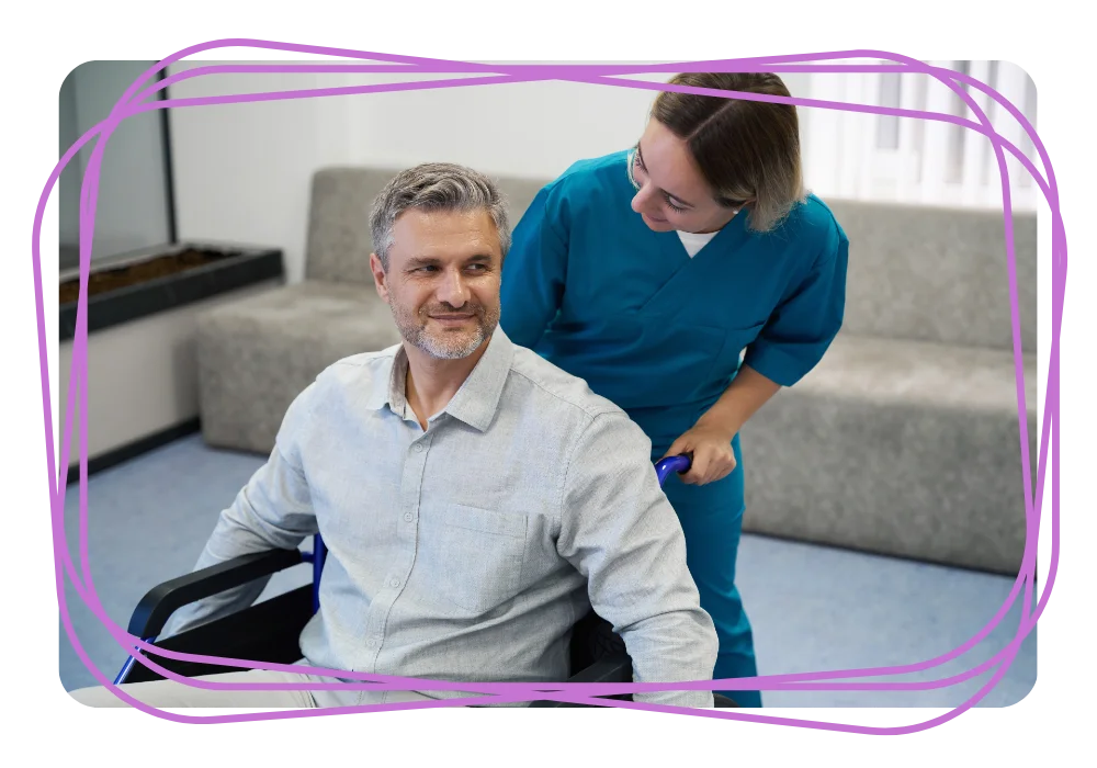 Nurse smiling with disabled man