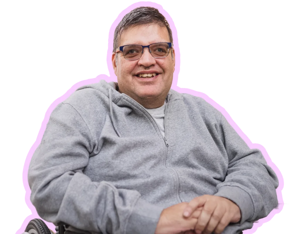Disabled man smiling in wheelchair