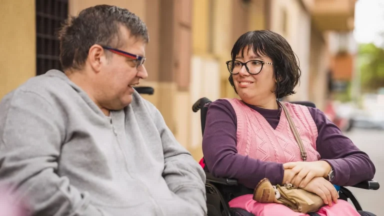 Two disabled friends talking